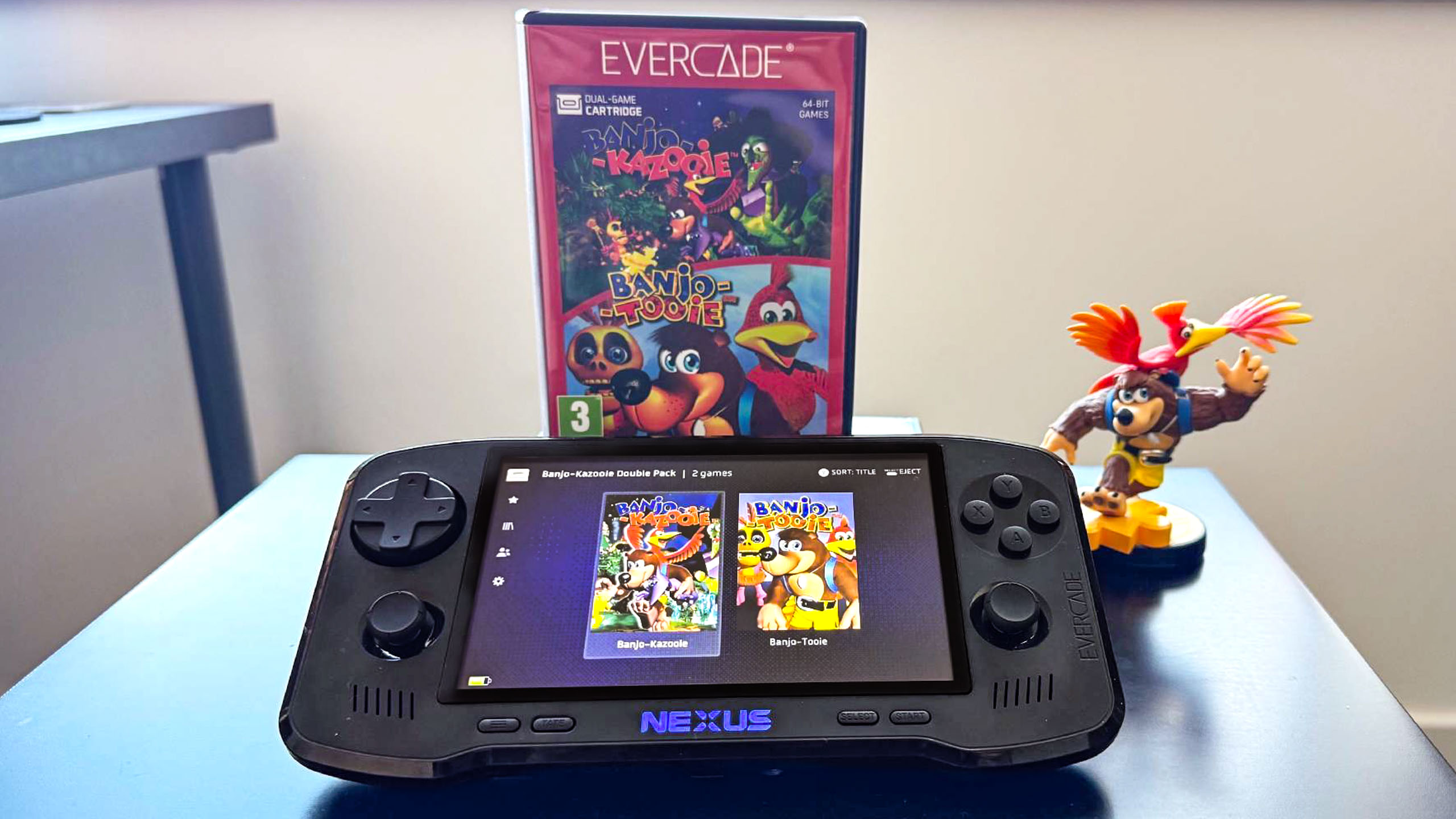 Evercade Nexus playing Banjo-Kazooie next to Evercade game case