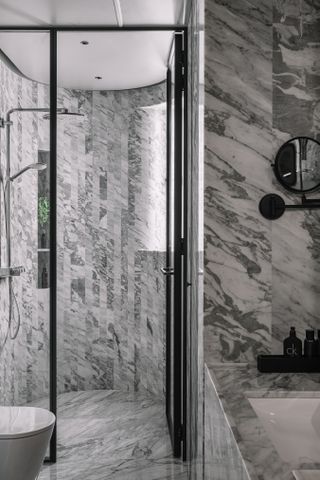 A bathroom in veined marble