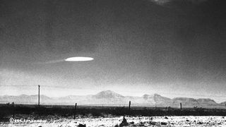 A government employee photographed a UFO that hovered for 15 minutes near Holloman Air Development Center in New Mexico, on Oct.16, 1957.