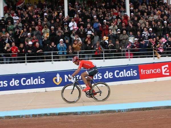 Fabian Cancellara (Saxo Bank) cruises down the home stretch on the Roubaix velodrome on his way to his second Paris-Roubaix victory.