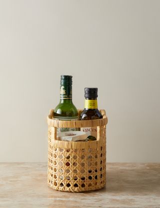 rattan basket holding sauces and jars