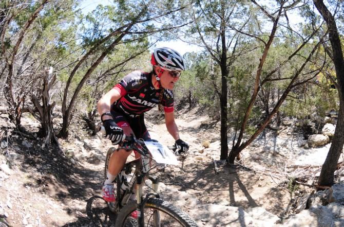 Erica Tingey (Team Jamis) riding out of the creek bed