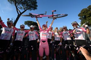 ROME ITALY MAY 26 Overall race winner Tadej Pogacar of Slovenia Pink Leader Jersey C Rui Oliveira of Portugal Mikkel Bjerg of Denmark Felix Grobschartner of Austria Vegard Stake Laengen of Norway Rafal Majka of Poland Juan Sebastian Molano of Colombia Domen Novak of Slovenia and UAE Team Emirates react after the 107th Giro dItalia 2024 Stage 21 a 125km stage from Rome to Rome UCIWT on May 26 2024 in Rome Italy Photo by Dario BelingheriGetty Images