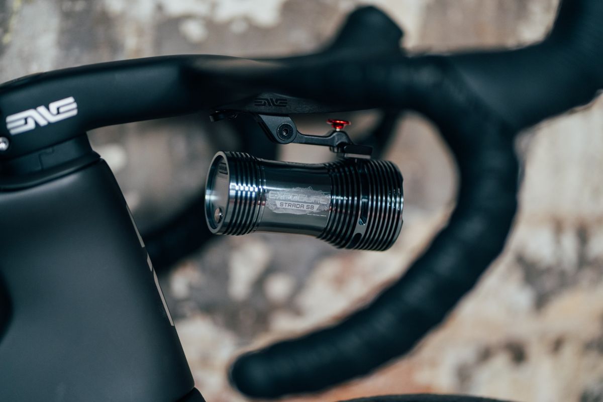 The Exposure Strada 13 SB attached to the bars of a road bike