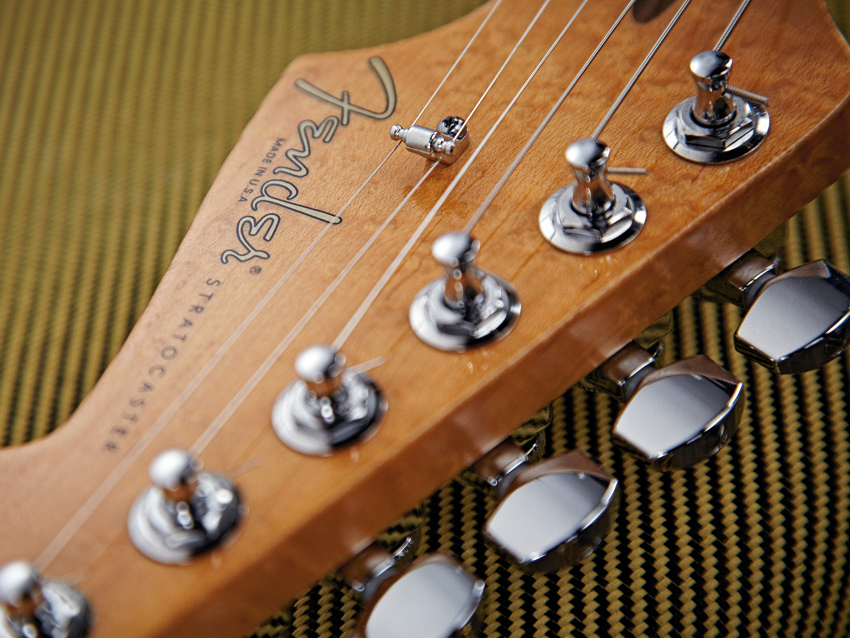 The Select Strat HSS's stagger-height tuners are locking.