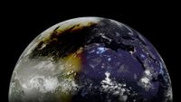 A picture of Earth captured from an orbiting spacecraft. Its right side is shadowed, and the moon's dark shadow can be seen darkening the daylit side during an eclipse.
