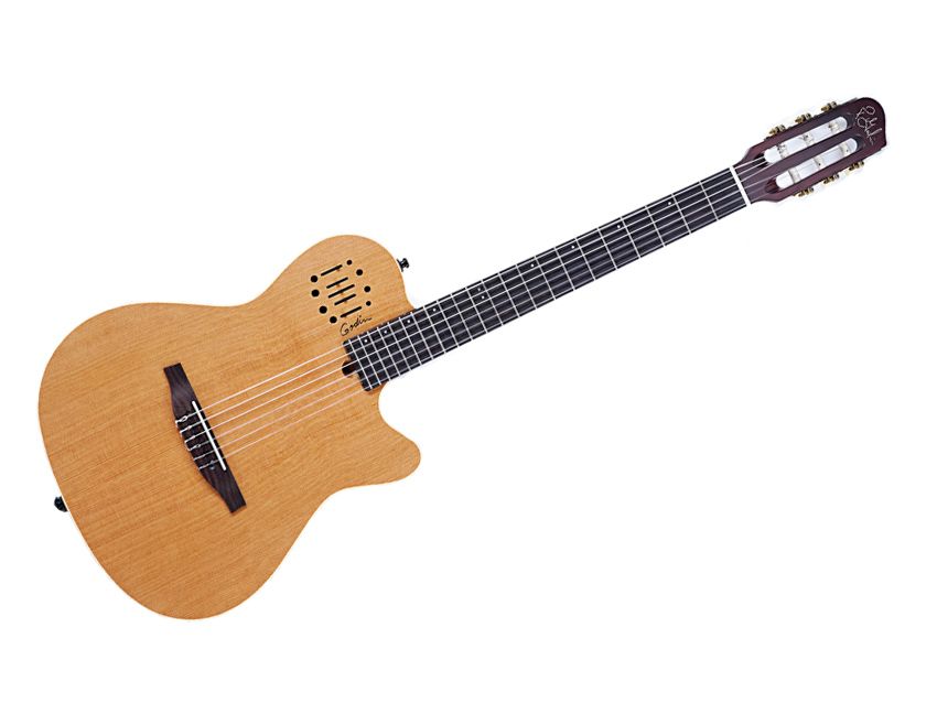 The guitar's top is solid cedar.
