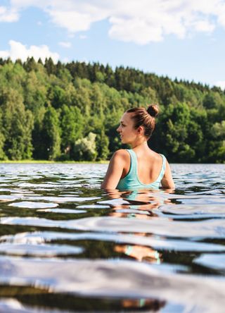 Woman wild swimming