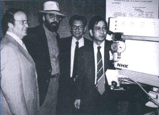 First showing of HDTV at the 1981 SMPTE Conference. (L to R): Joe Flaherty, Francis Ford Coppola, Joseph Polansky, Takashi Fujio