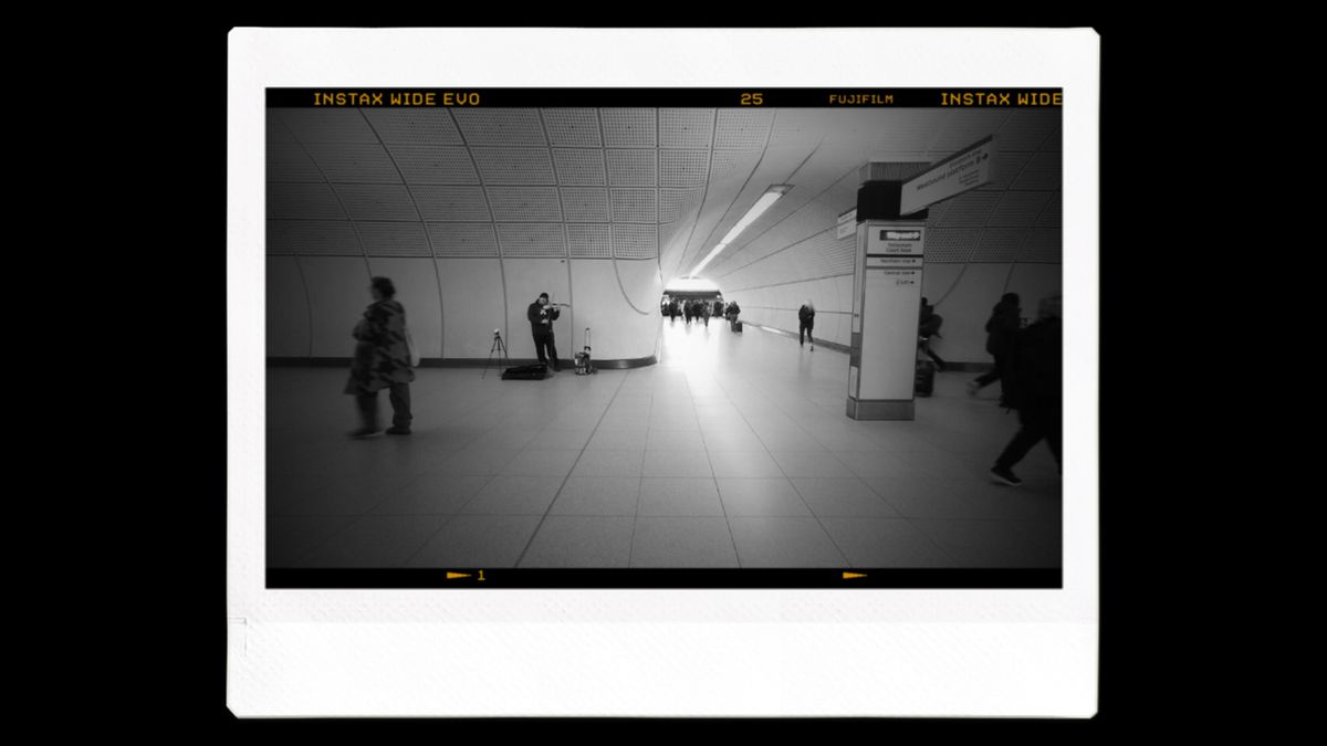 An Instax image printout of an underground station in black and white