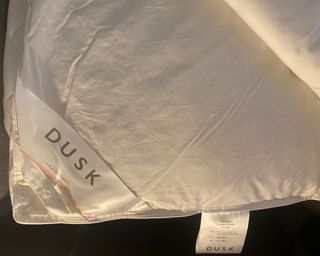 Dusk supreme mattress topper corner with care label and logo
