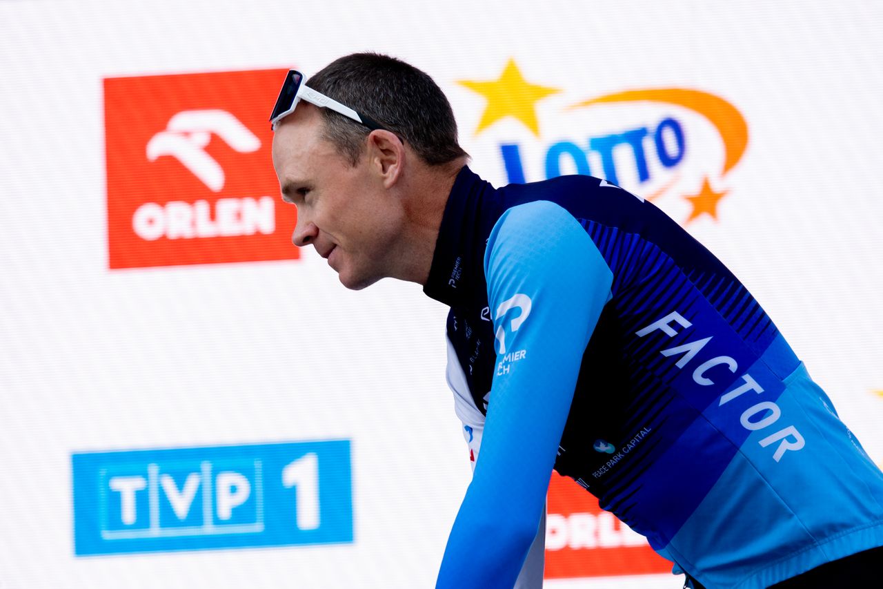 Chris Froome rides off stage at the Tour of Poland