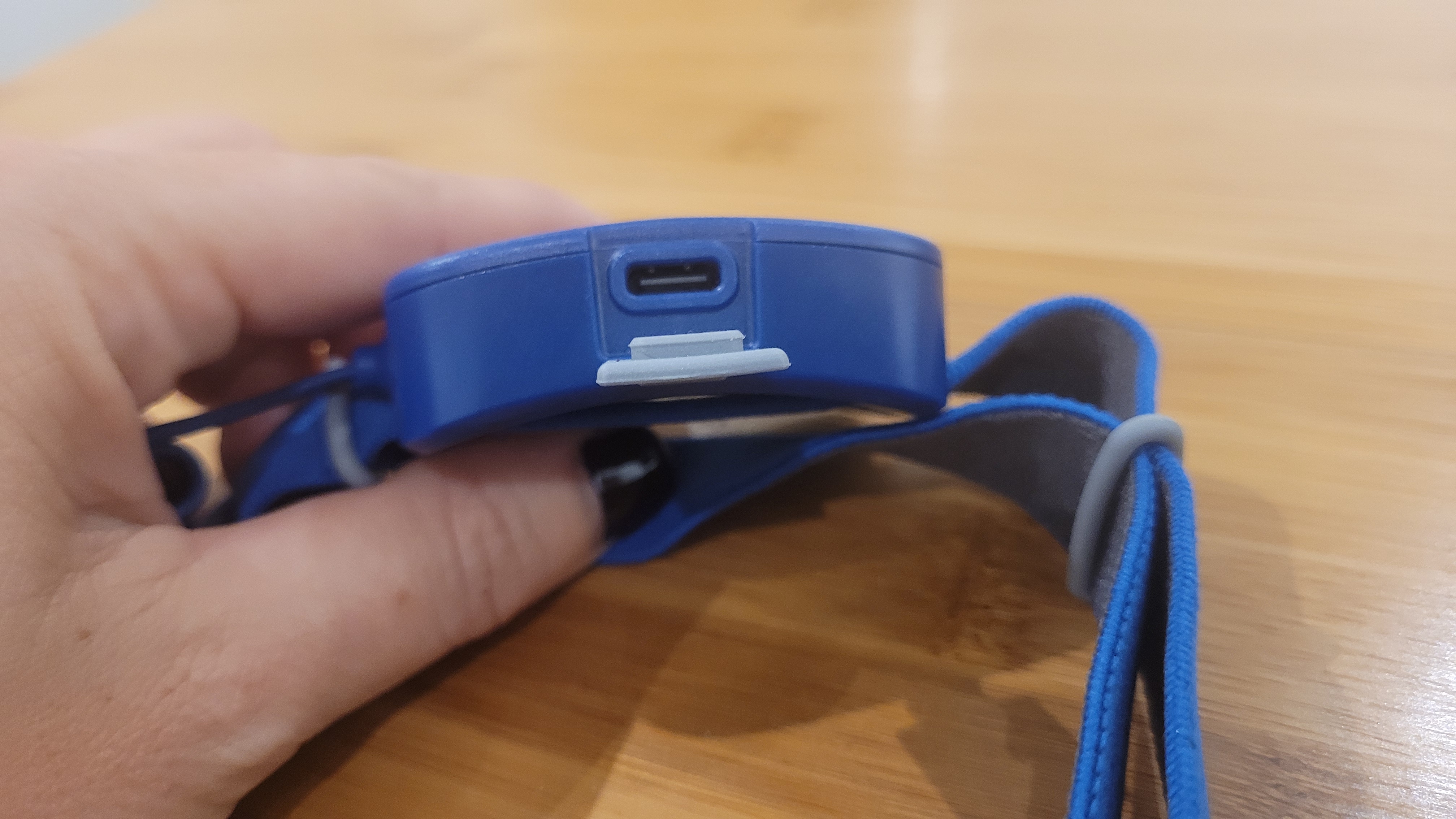 Biolite 425 headlamp in the hand showing the USB-C connection
