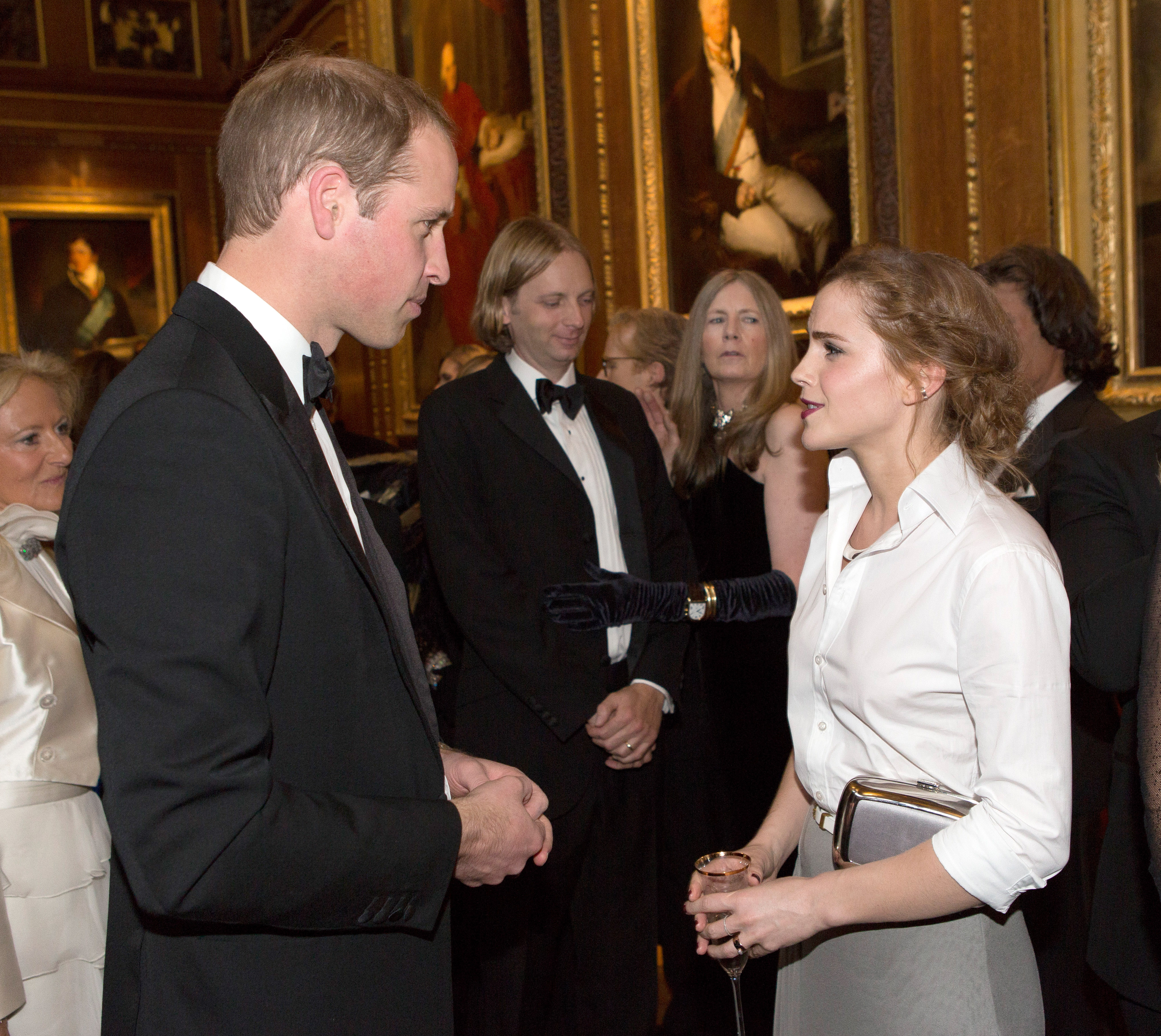 Prince William, Duke of Cambridge (L) and Emma Watson attend a dinner to celebrate the work of The Royal Marsden hosted by the Duke of Cambridge on May 13, 2014 in Windsor, England