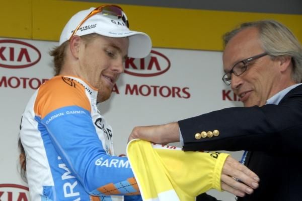 It's all yours: Tyler Farrar accepts the final yellow jersey at Franco-Belge.