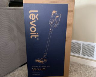 Image of the Levoit VortexIQ40 Cordless Stick Vacuum being unboxed at home
