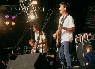 Stahl on stage with Foo Fighters in 1998