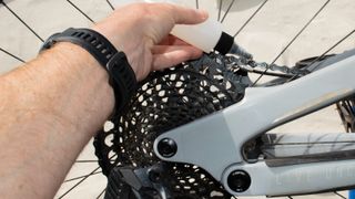 Lubing the top of a bicycling chain