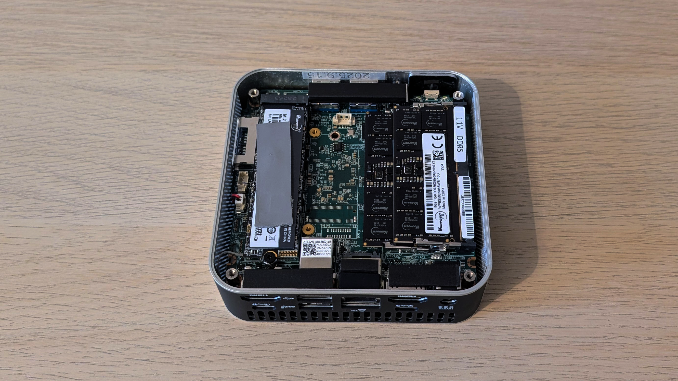 The Geekom A8 AI mini PC on a desk