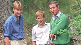 Prince William, Prince Harry and King Charles pose for photographers August 16, 1997