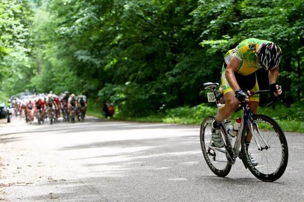 Brandon Gritters (Nature Valley) tries to maintain a gap on the field as they hit the KOM.