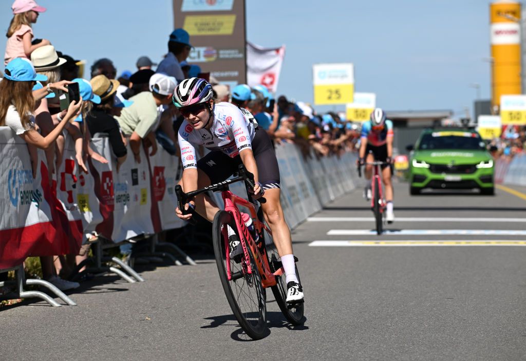 CHAMPAGNE SWITZERLAND JUNE 18 Neve Bradbury of Australia and Team CanyonSram Racing White Best Young Rider Jersey crosses the finish line during the 4th Tour de Suisse Women 2024 Stage 4 a 1275km stage from Champagne to Champagne UCIWWT on June 18 2024 in Champagne Switzerland Photo by Tim de WaeleGetty Images