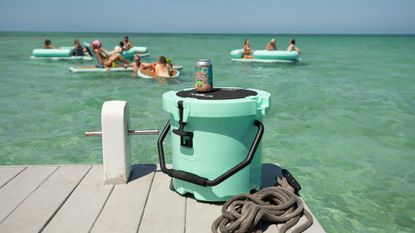 best cool box for camping: BOTE KULA cooler on a beach