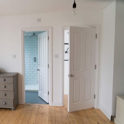 bedroom with wooden flooring 