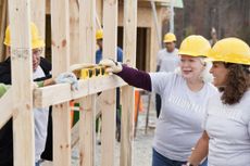 Volunteers working on construction site