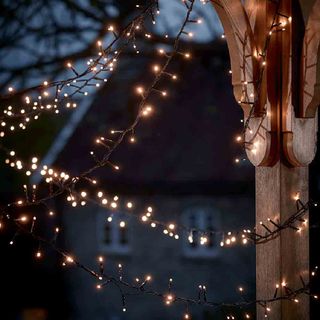 festive light with wooden beam and christmas decor