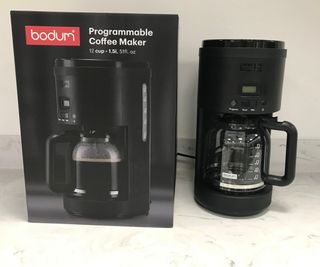 Bodum Bistro Programmable Coffee Maker on countertop beside box