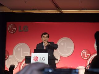 Dr Woo Paik shows off the new LG mobile phone watch