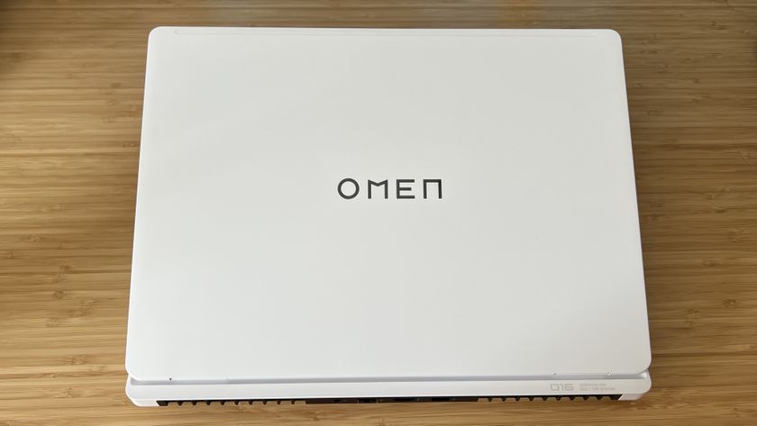 HP Omen Max 16 gaming laptop lid on a wooden desk