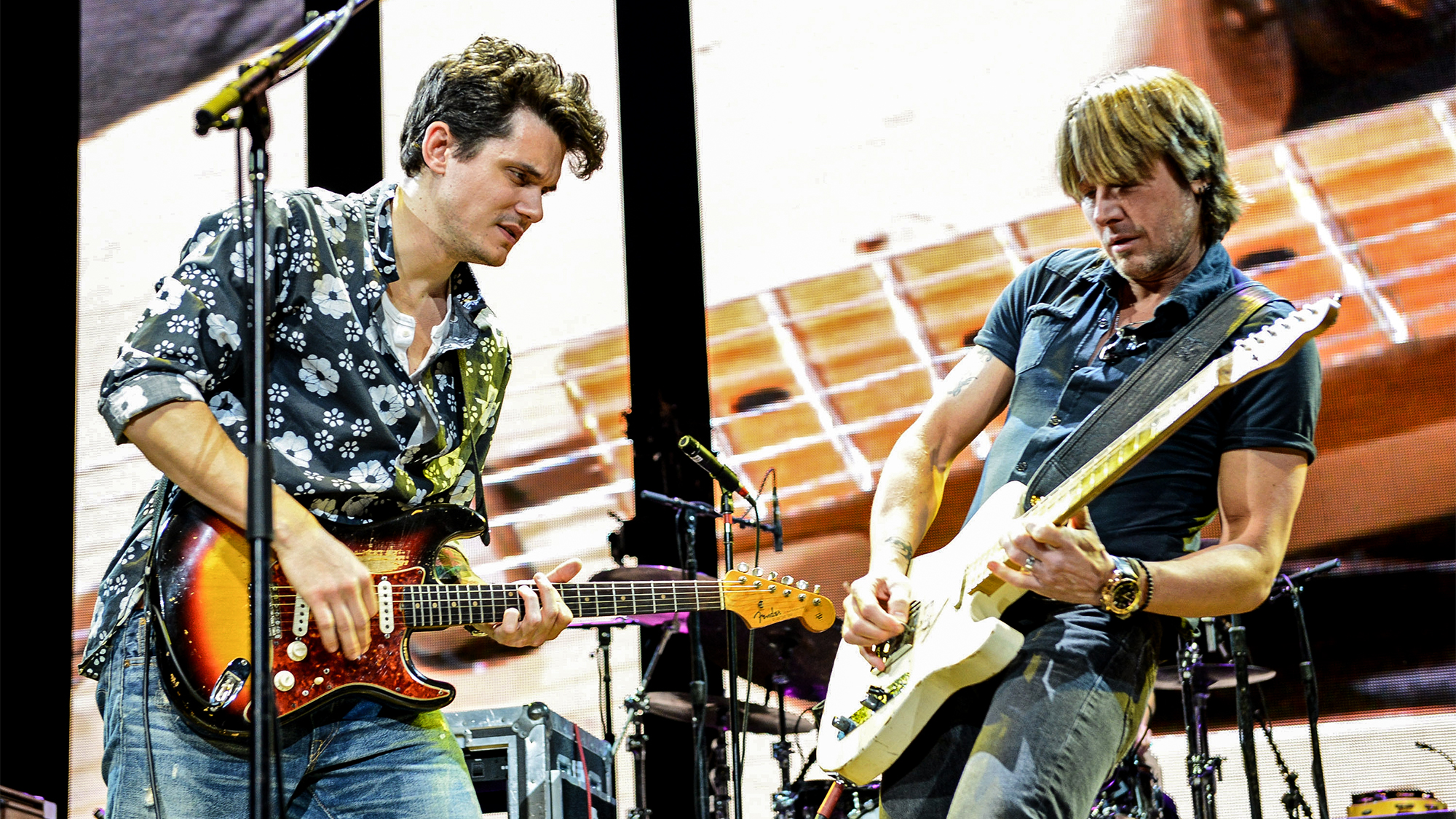 John Mayer and Keith Urban perform on stage during the 2013 Crossroads Guitar Festival at Madison Square Garden on April 12, 2013 in New York City.