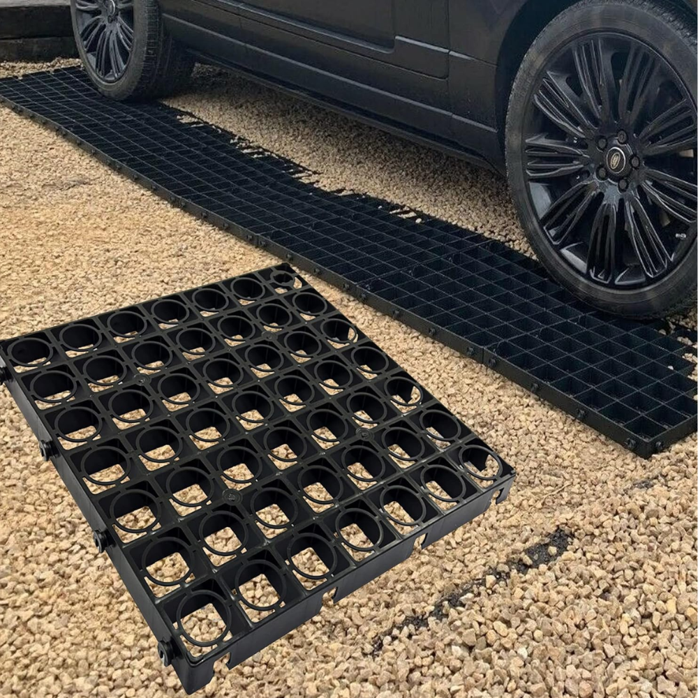 Gravel grid on a gravel surface with a black car