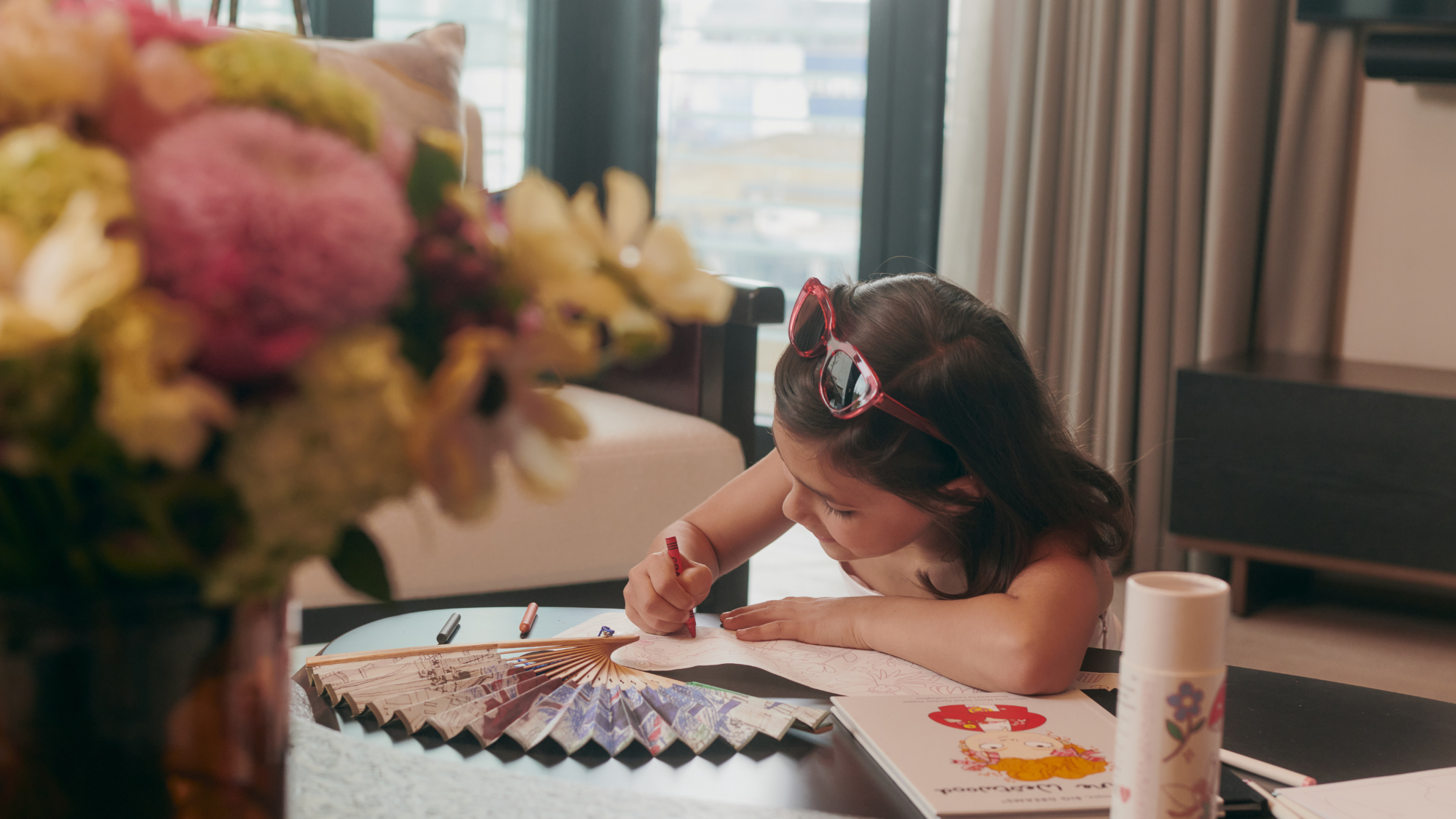Child drawing in Mandarin Oriental Mayfair suite