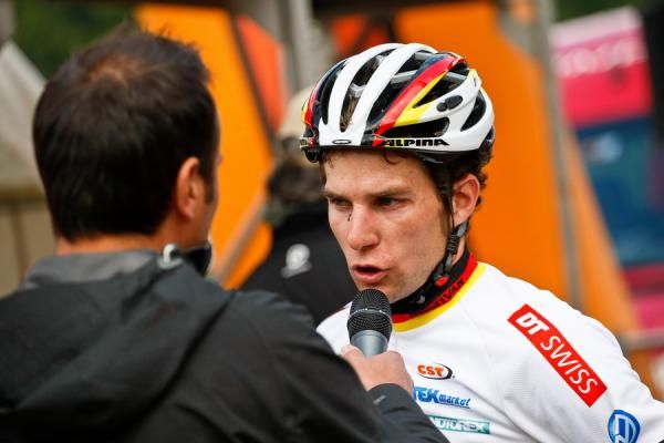 Moritz Milatz speaks with the commentator after his win.