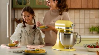 KitchenAid Artisan 4.8L Stand Mixer in the butter hue, which is their 2025 Colour Of The Year