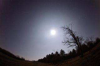 This photo of a Geminid meteor was taken by skywatcher Monika Landy-Gyebnar Dec. 14, 2011, over Veszprem, Hungary.