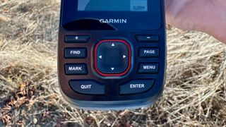 The bottom buttons on the Garmin GPSMAP 67i
