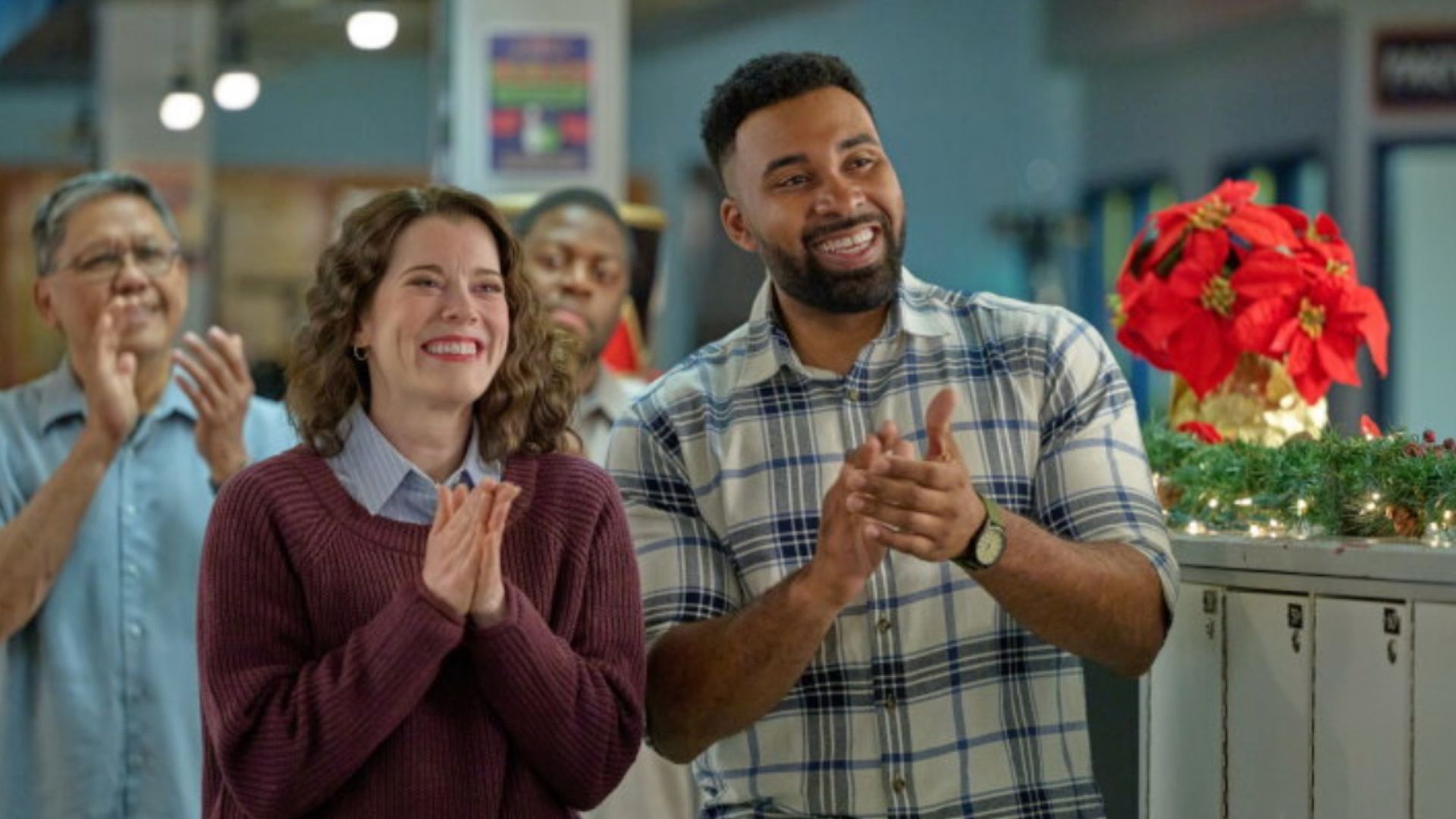 Savannah Meslin and Carlisle J. Williams smile as they star in Winter Wonderlanes.