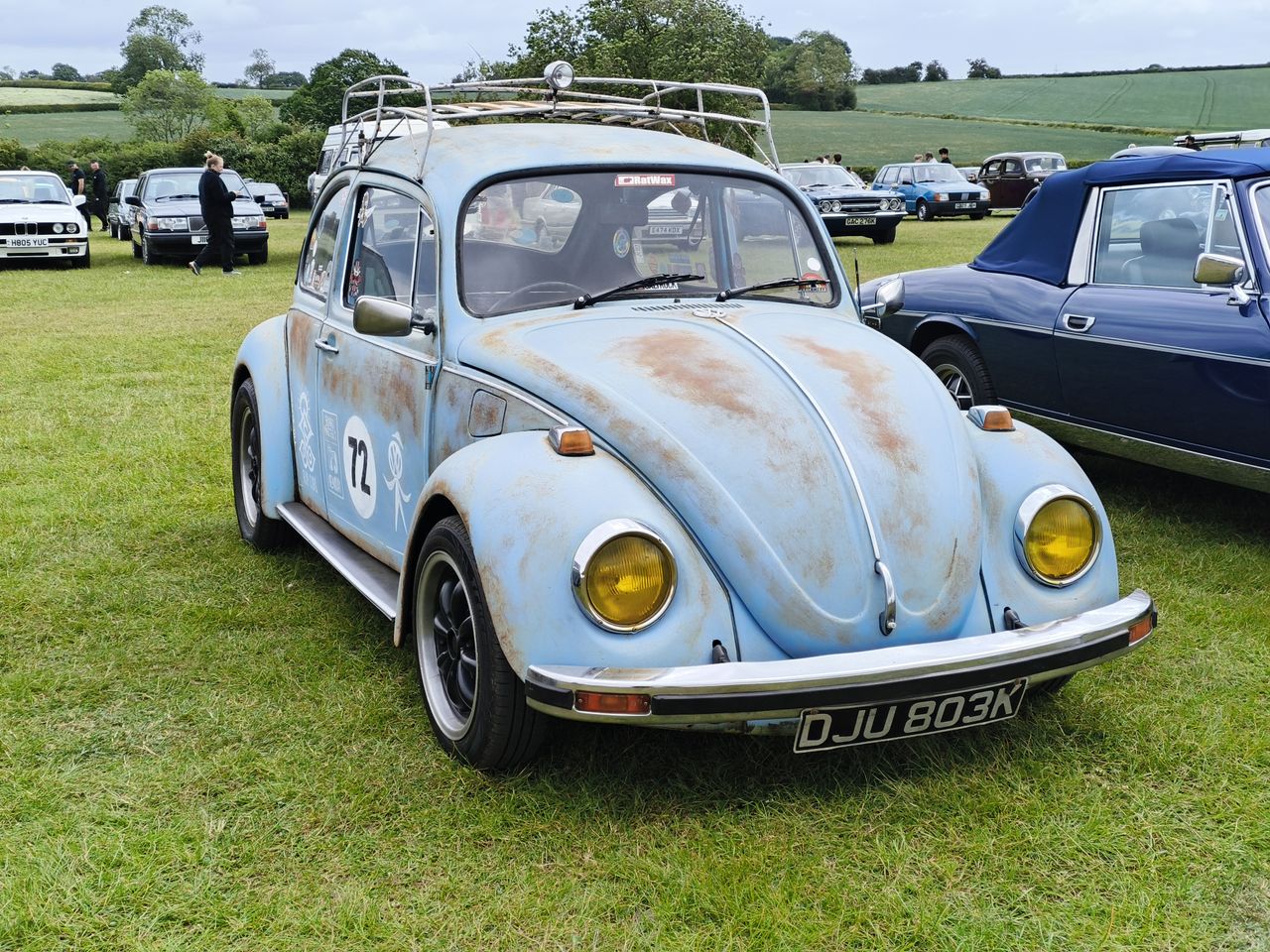 Classic vintage car in a field