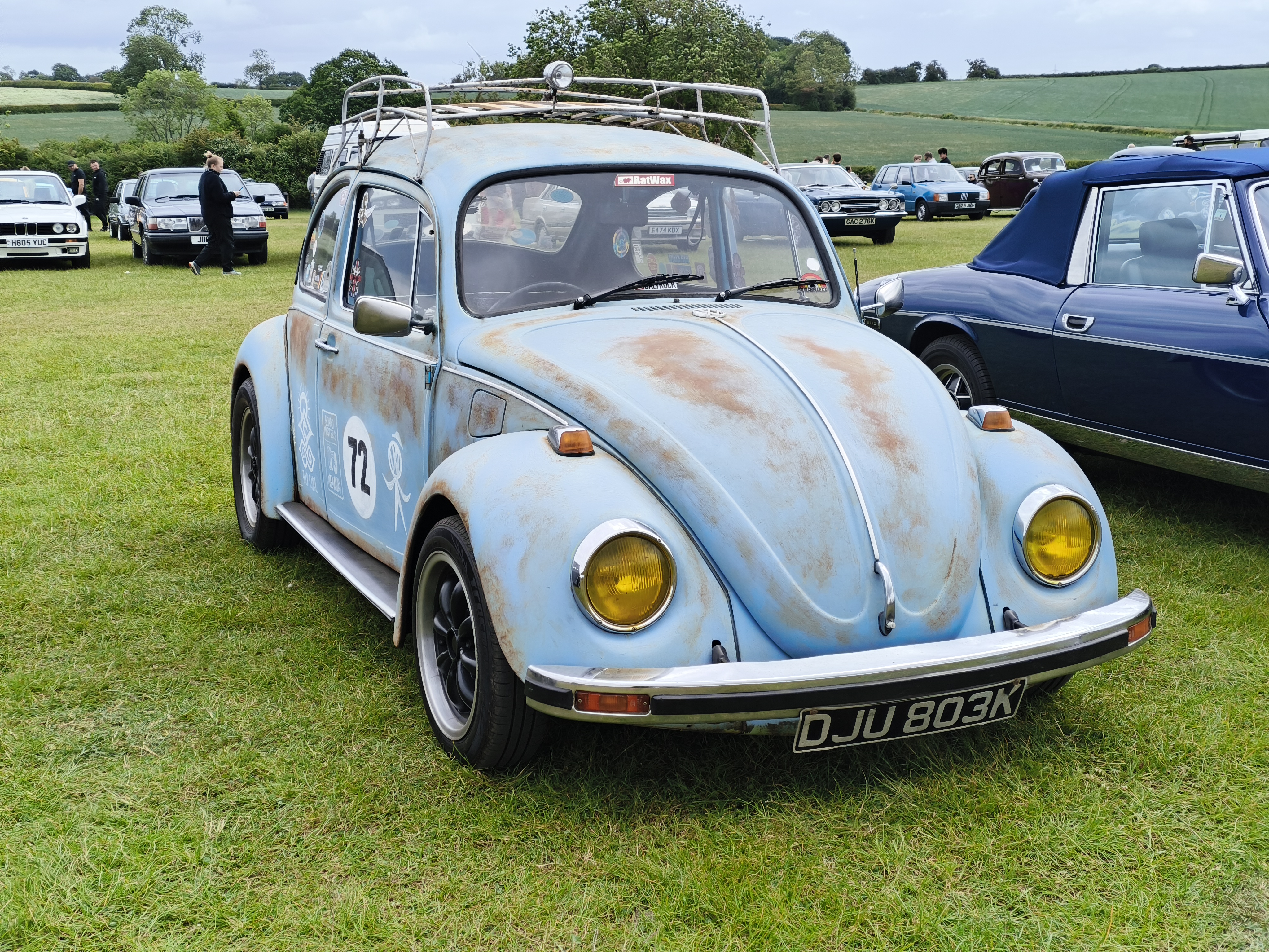 Classic vintage car in a field