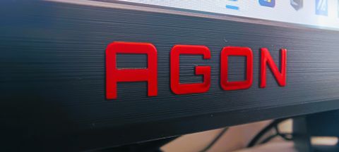 An AOC AGON AG275QZ monitor sitting on a table