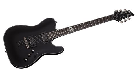 Looks-wise, it's the tasteful black binding, with three pinstripes on the body and one on the neck, that makes this guitar