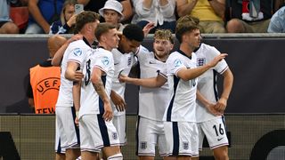 Harvey Elliott celebrates with teammates after scoring the second goal against Spain for England U21's.