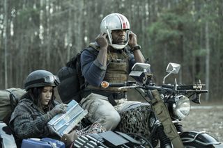 Two unknown characters on a motorcycle with sidecar on Tales of the Walking Dead