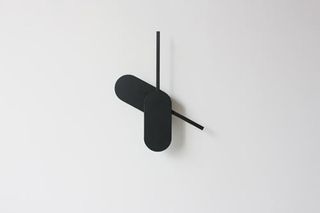 The Big Hands Clock minimalistic design explores the perception of time