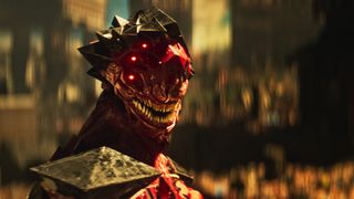 Babiru DaVinci Resolve colour tips; a red creature in armour, it has a large toothy grin, in the background is a cyberpunk style city