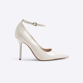 Ankle strap heeled court shoes